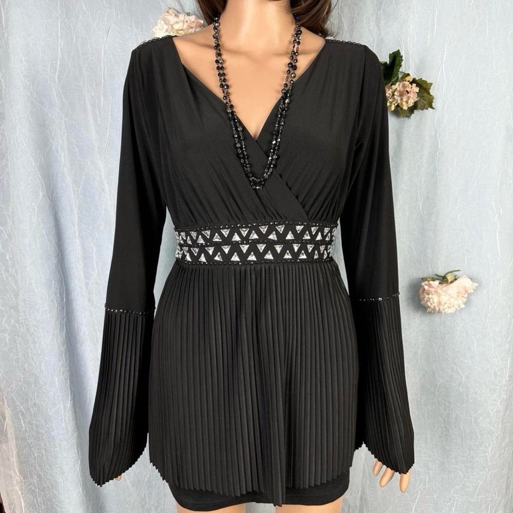 kaily. k womens flowy pleated babydoll flared sleeve v neck top.